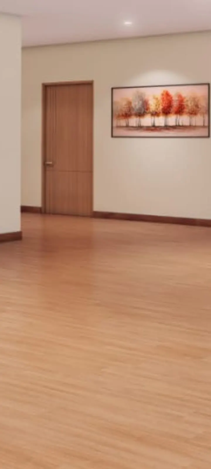 Home corridor with wooden laminate flooring and wall art