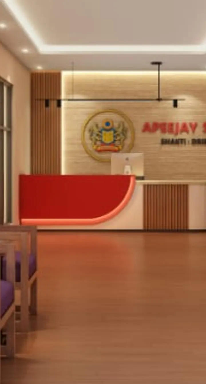 3D design of a reception with red curved desk and false ceiling